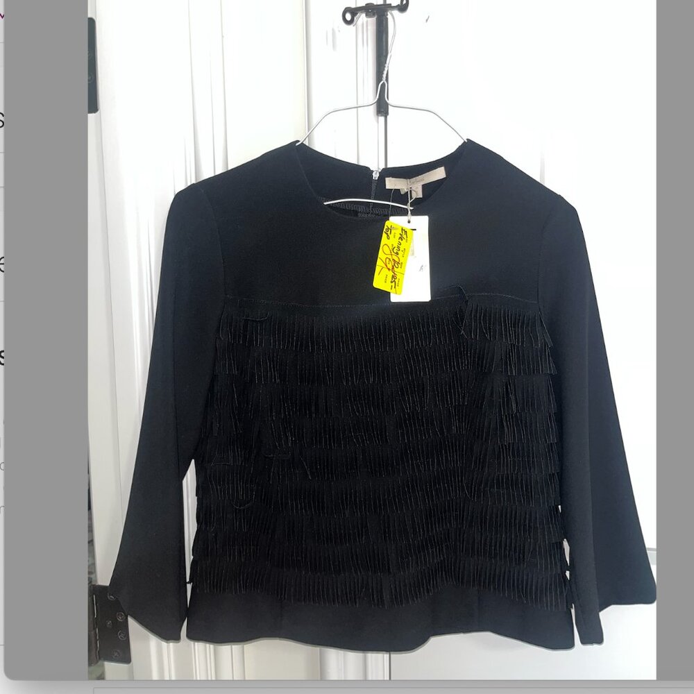 black shirt with flinges